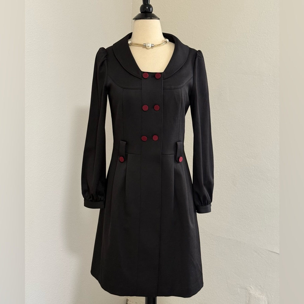 Elegant Black Dress with Burgundy Accents
By Viola Per Donna
